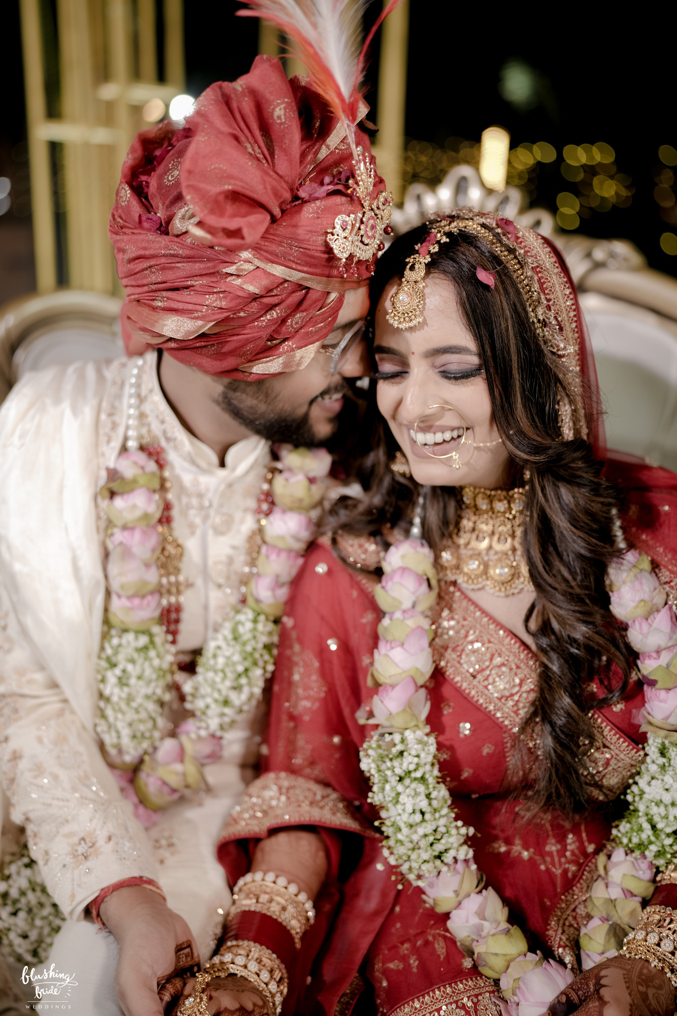 Bride and groom seated together after the ceremony
