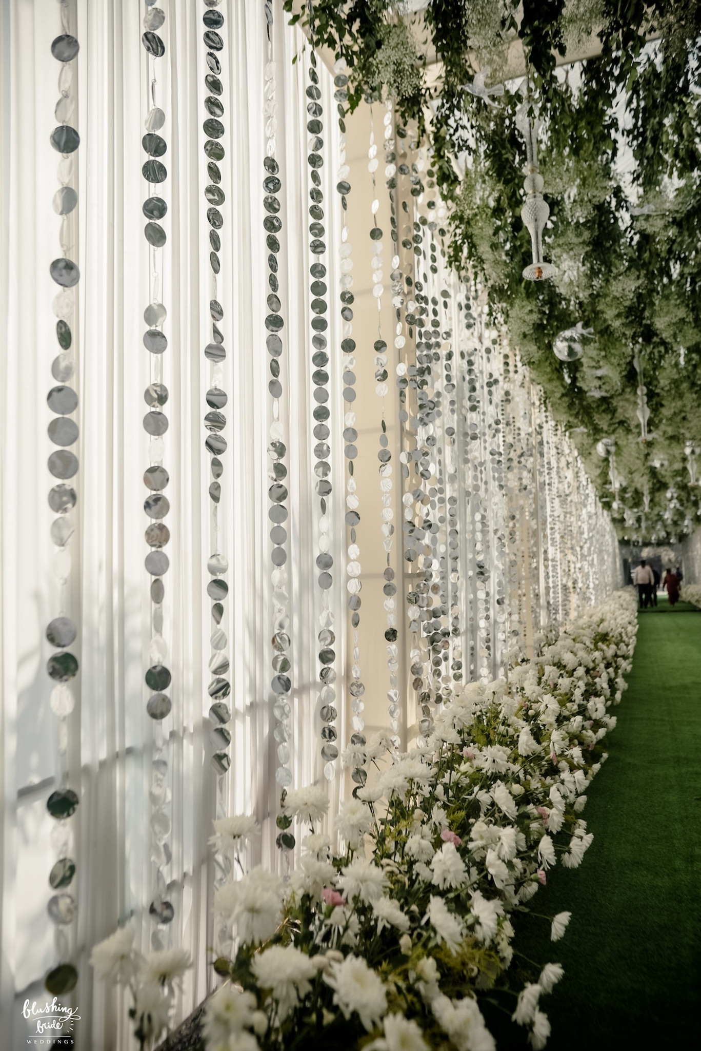 Wall of hanging floral strands