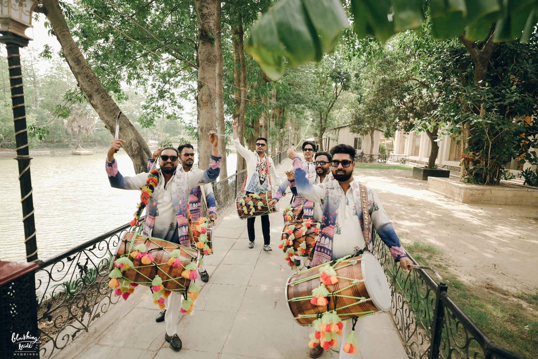 The team walking through a venue before a celebration