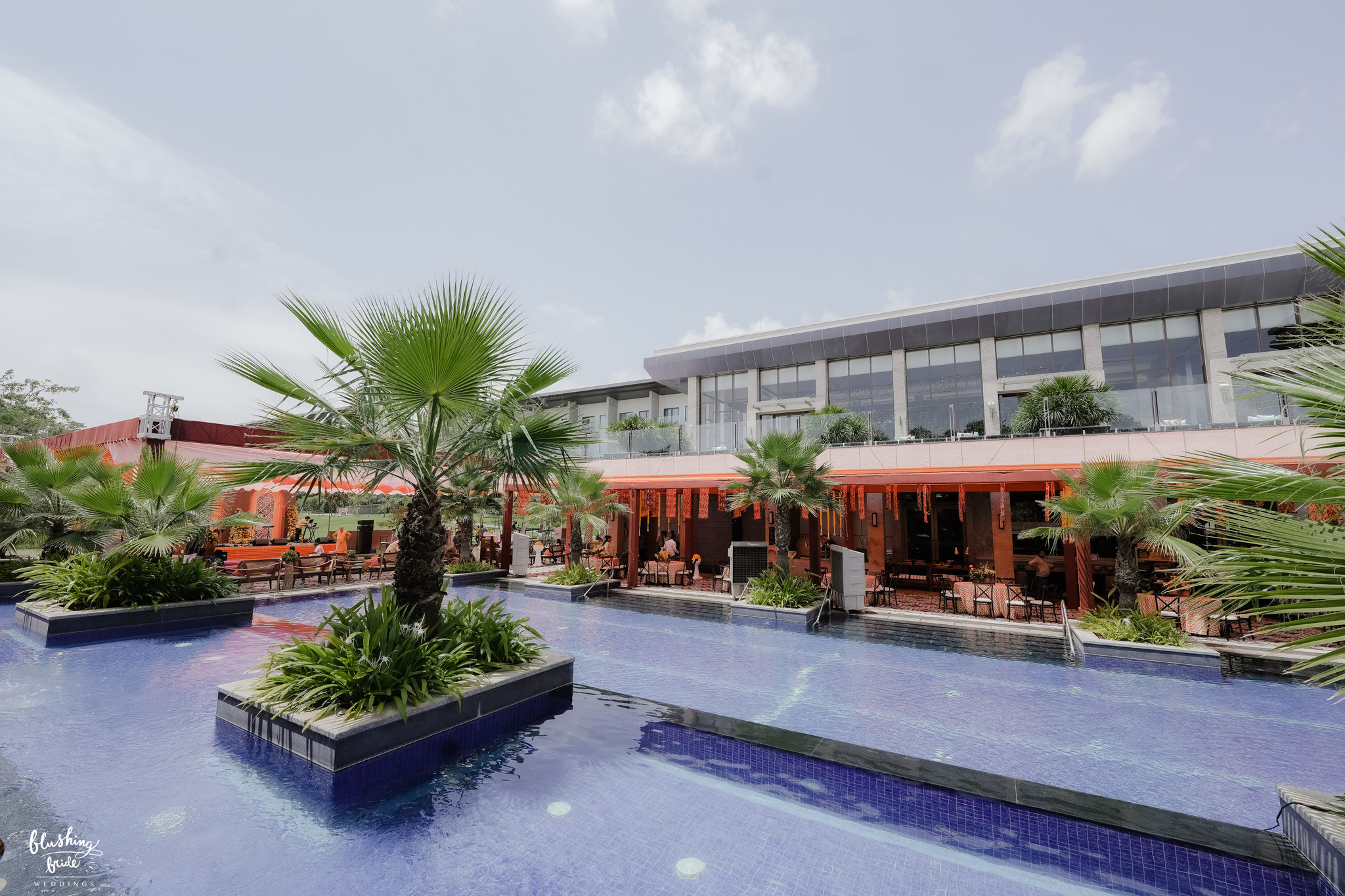 Poolside venue dressed for a daytime celebration